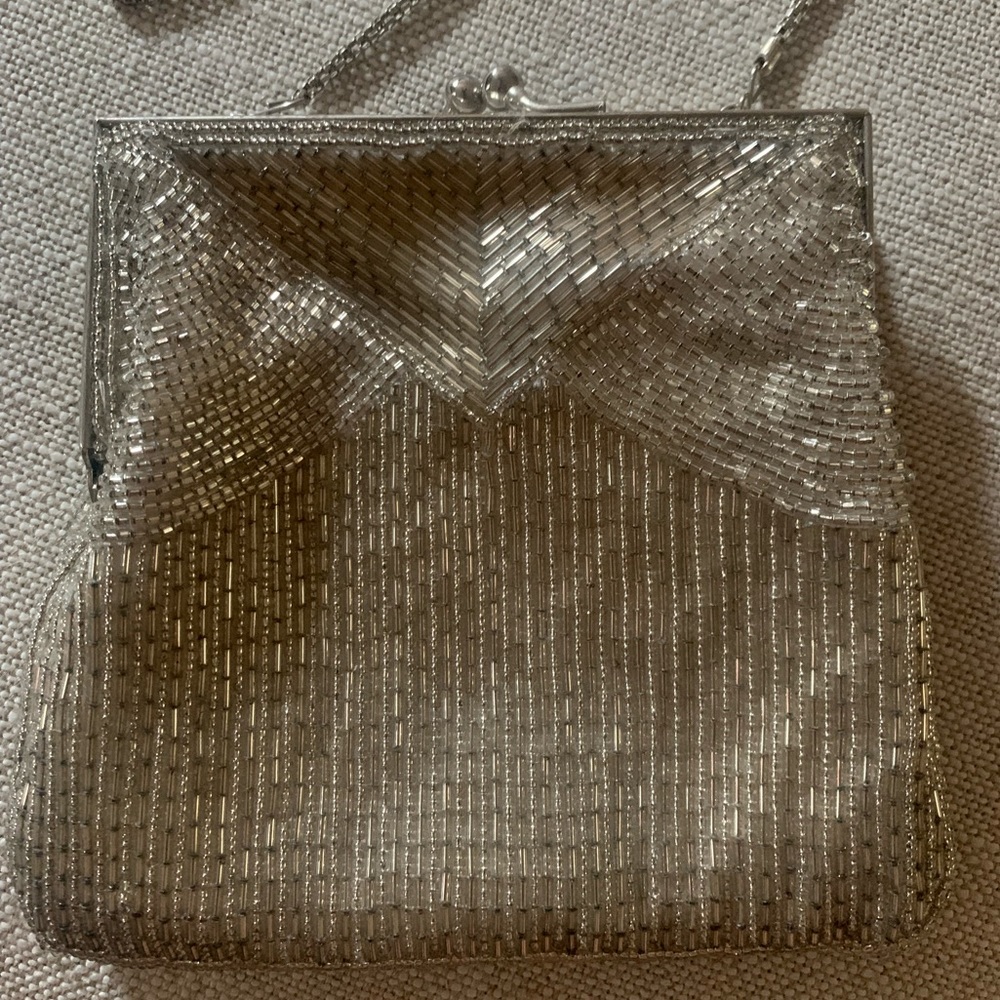 So chic, beaded clutch is so sophisticated- perfect for any night on the town!